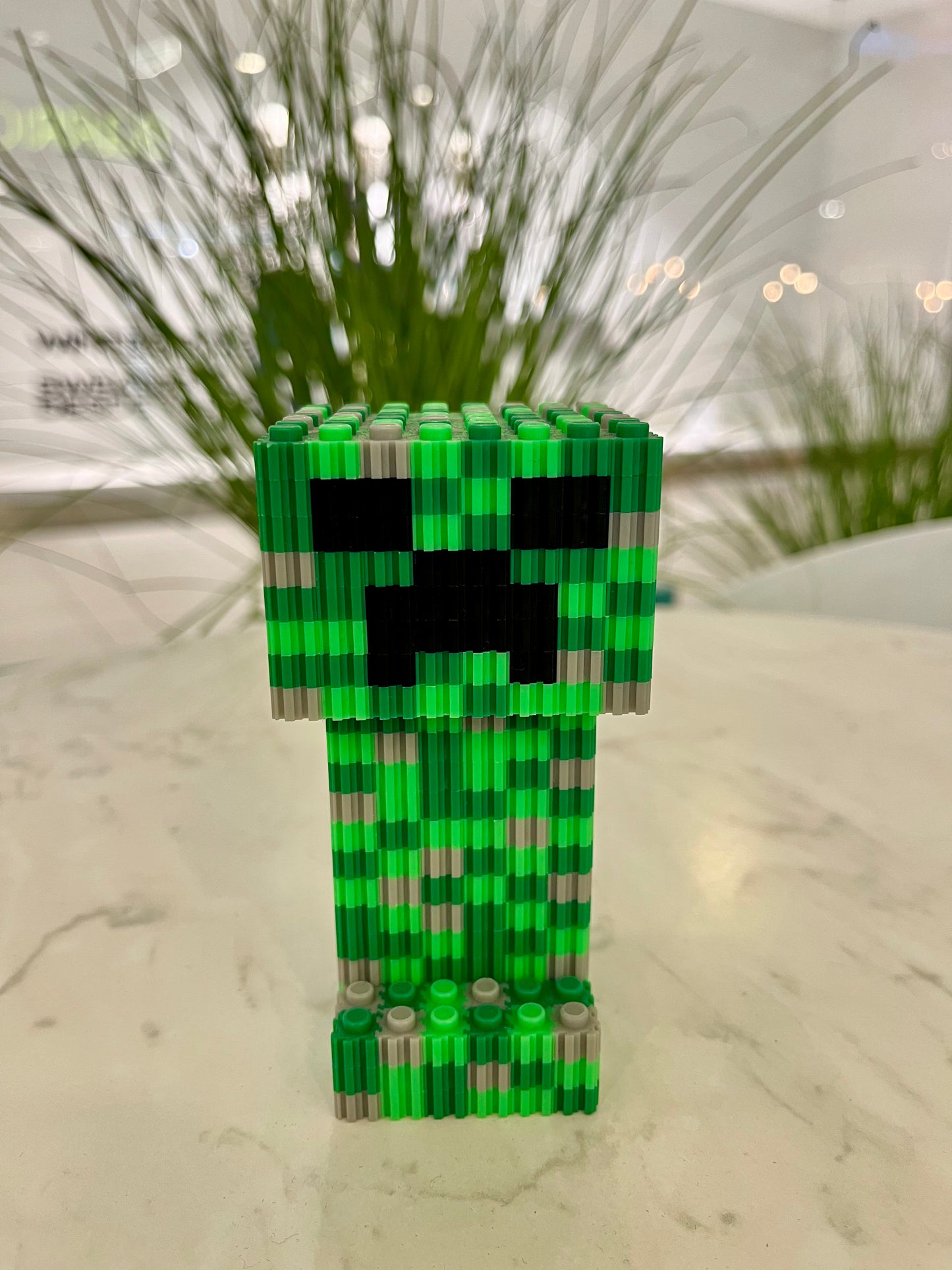 Figura pixel armable de Creeper de Minecraft