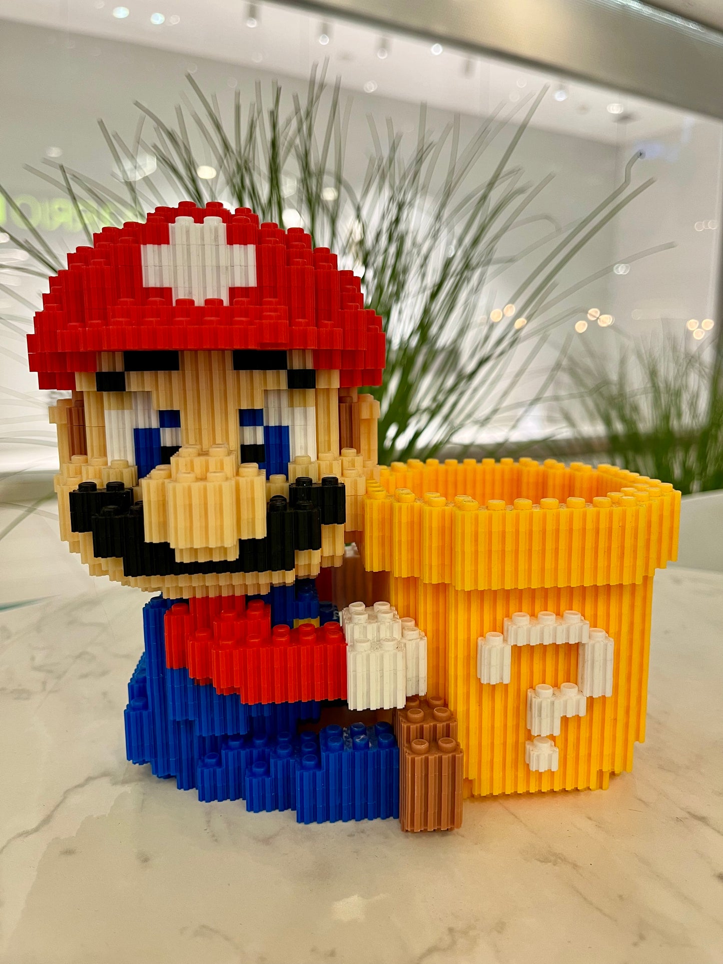 Figura pixel armable de Mario con tubería de Super Mario Bros