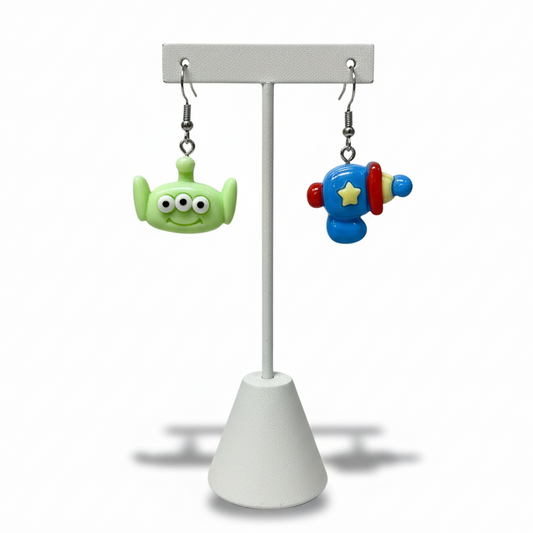 Aros Marciano y Pistola de Juguete de Toy Story